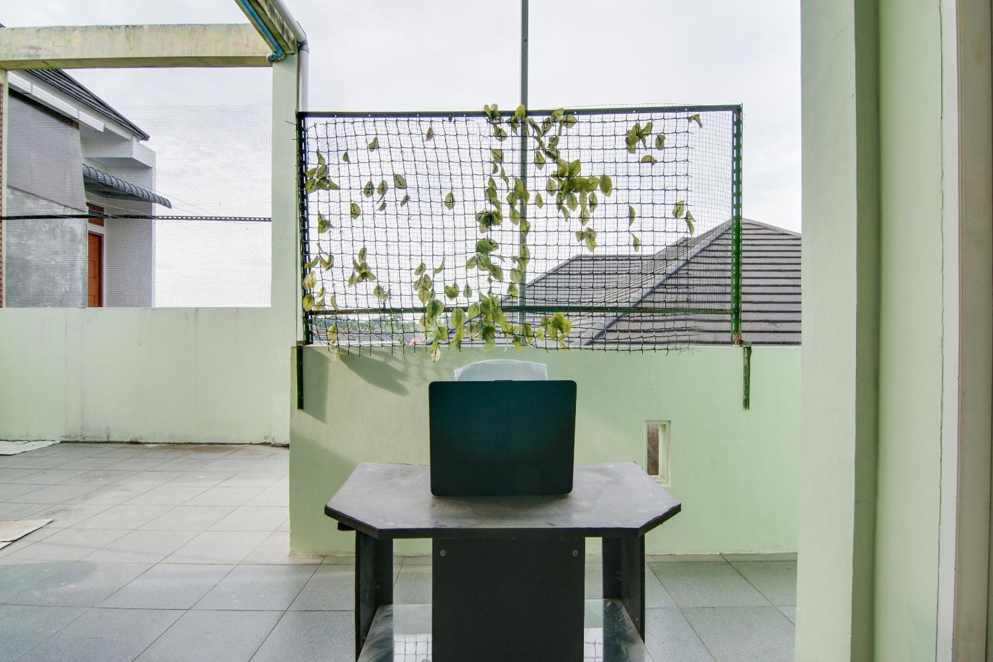 Spot On 91858 Raja Homestay Syariah Pekanbaru Esterno foto