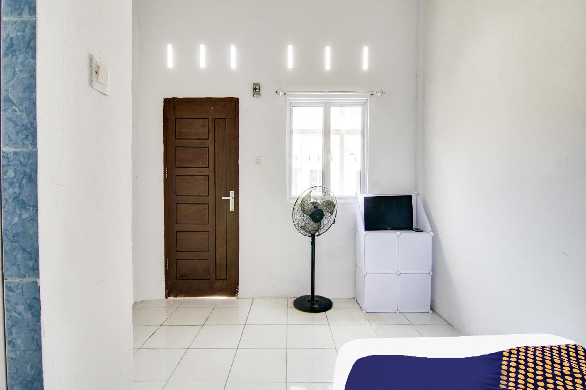 Spot On 91858 Raja Homestay Syariah Pekanbaru Esterno foto