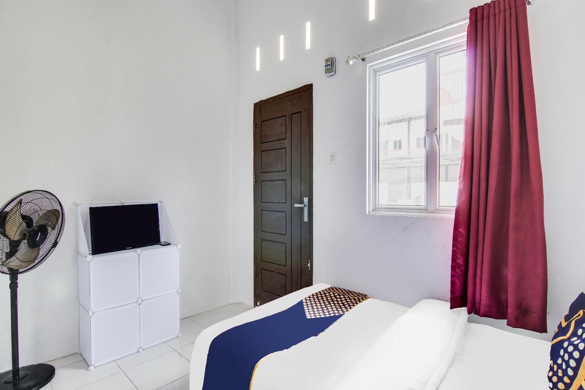 Spot On 91858 Raja Homestay Syariah Pekanbaru Esterno foto