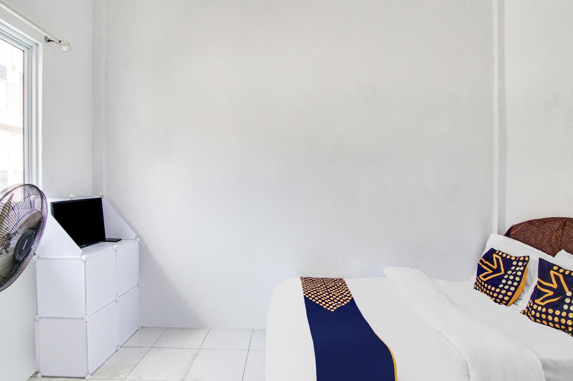 Spot On 91858 Raja Homestay Syariah Pekanbaru Esterno foto