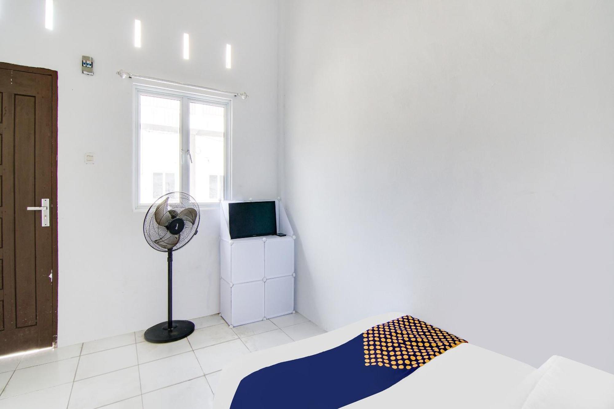 Spot On 91858 Raja Homestay Syariah Pekanbaru Esterno foto